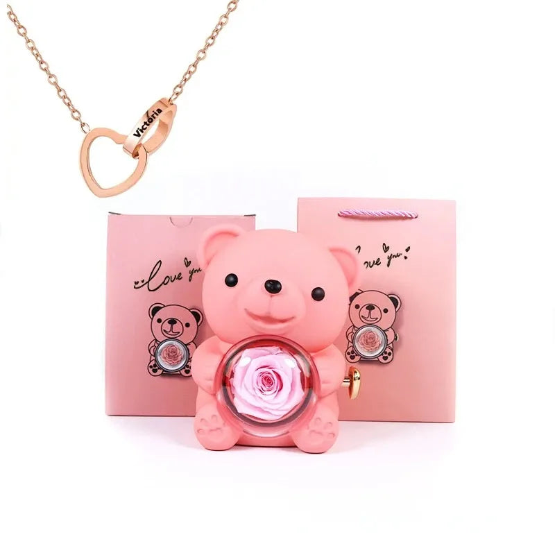 Osito de peluche con collar de la rosa eterna